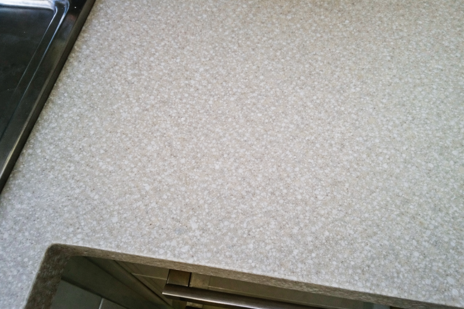 Repaired countertop with speckled pattern