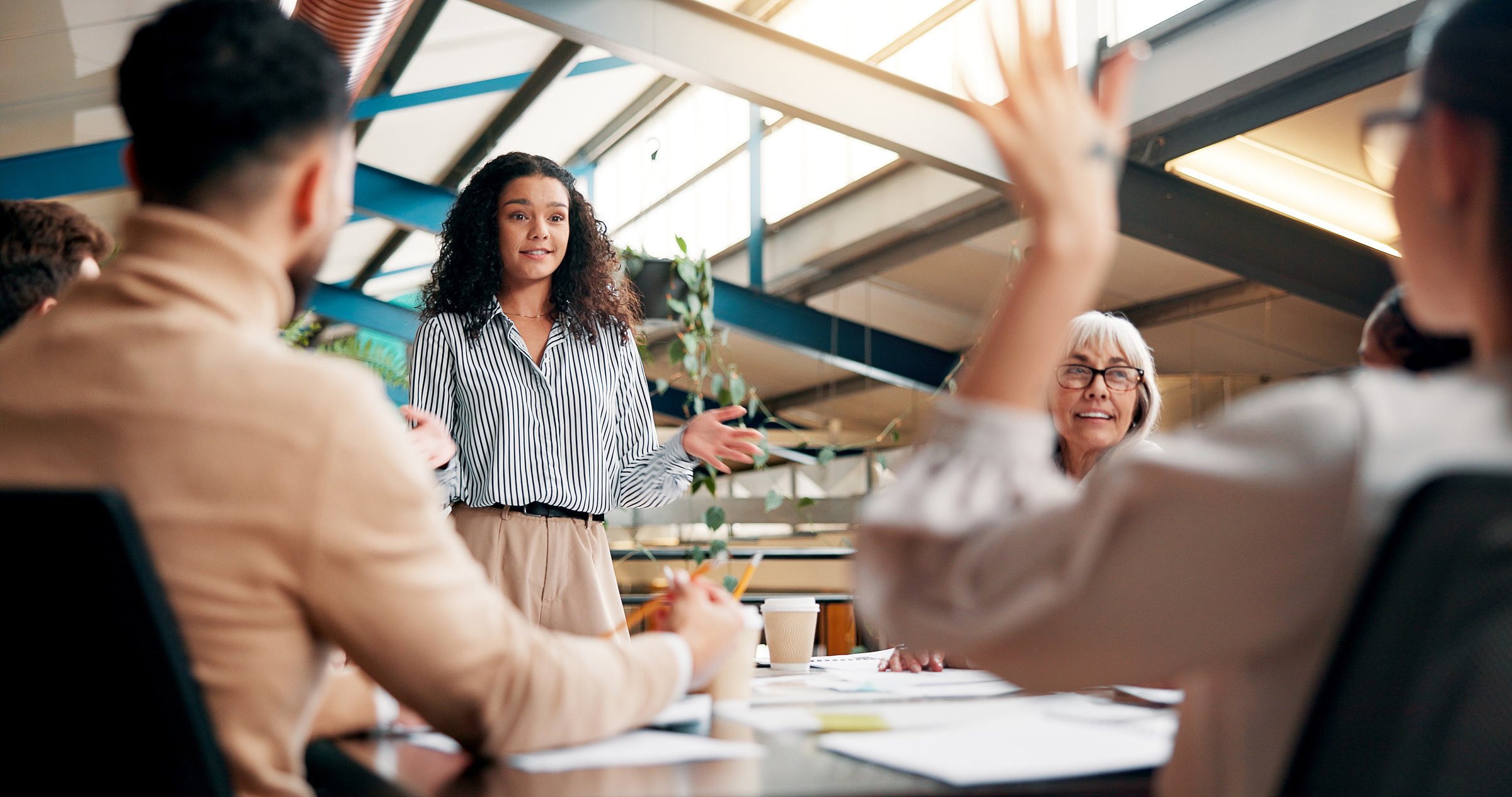 Presentation, ideas and woman in boardroom, creative and brand specialist with project or brainstorming. Business, teamwork and people with strategy for target audience, trends or speech for workshop