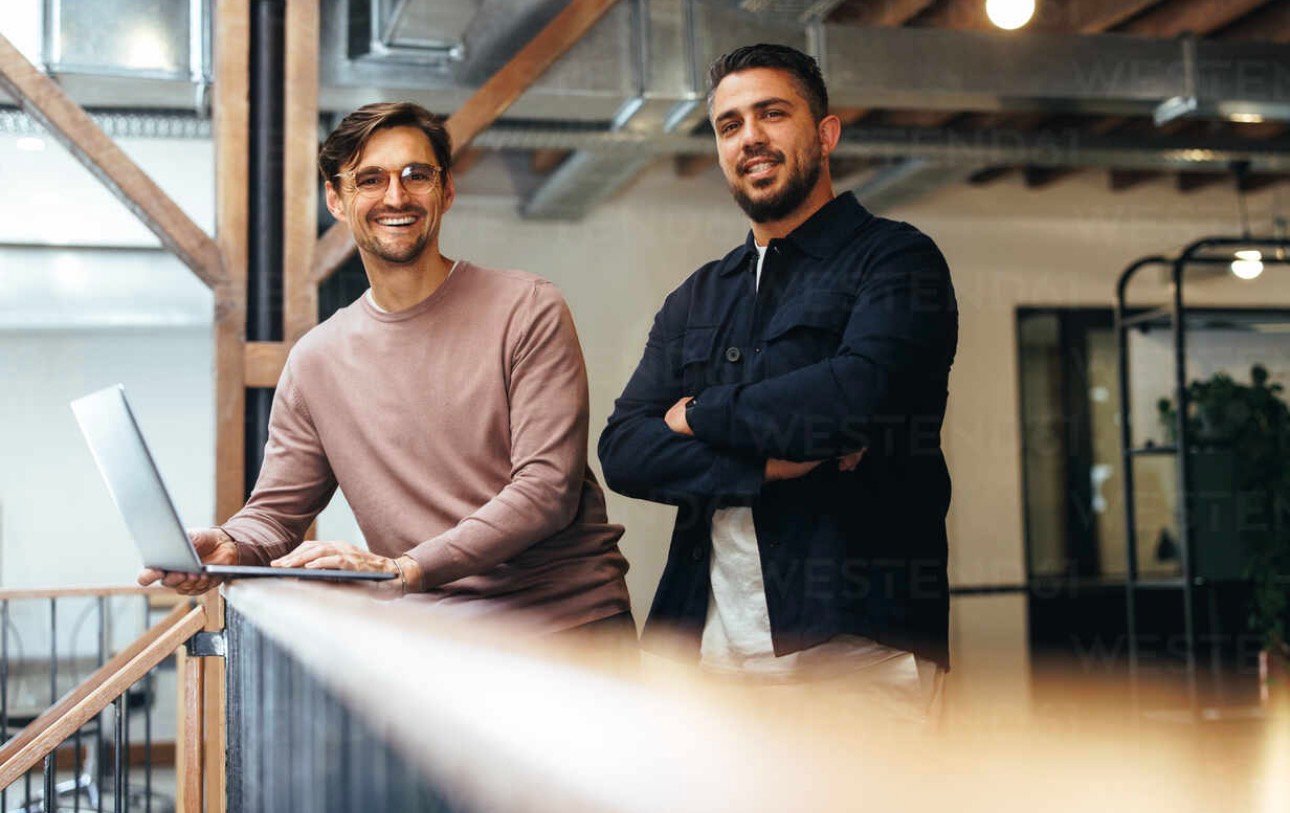 Two professionals in office