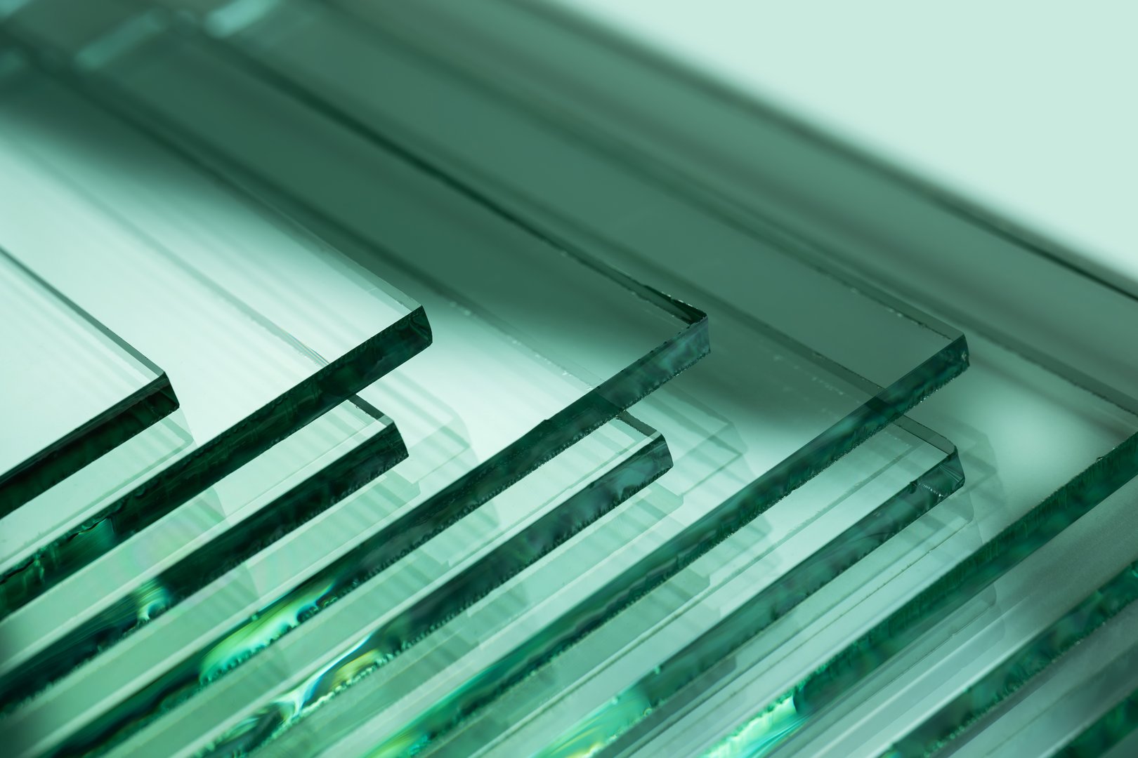 Sheets of Factory manufacturing tempered clear float glass panels cut to size.