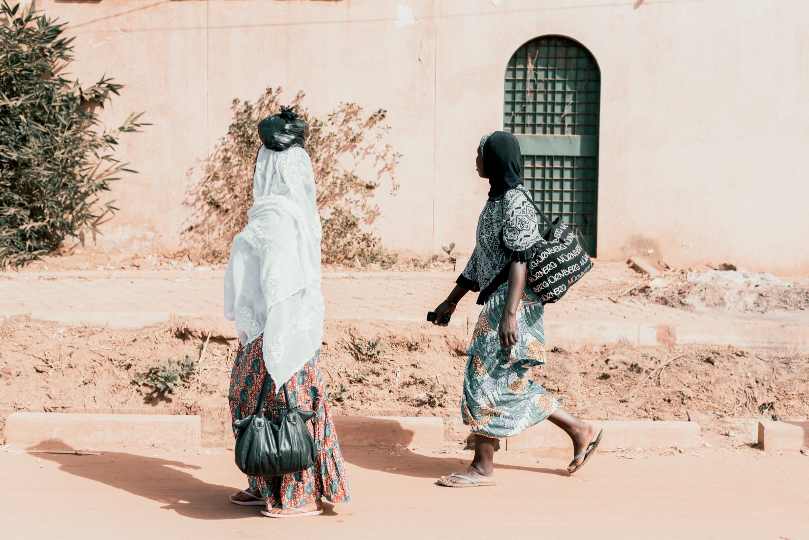 Ouagadougou, Burkina Faso, December 2017. In this image you can see some people moving on the main road that leads to the capital Ouagadougou.