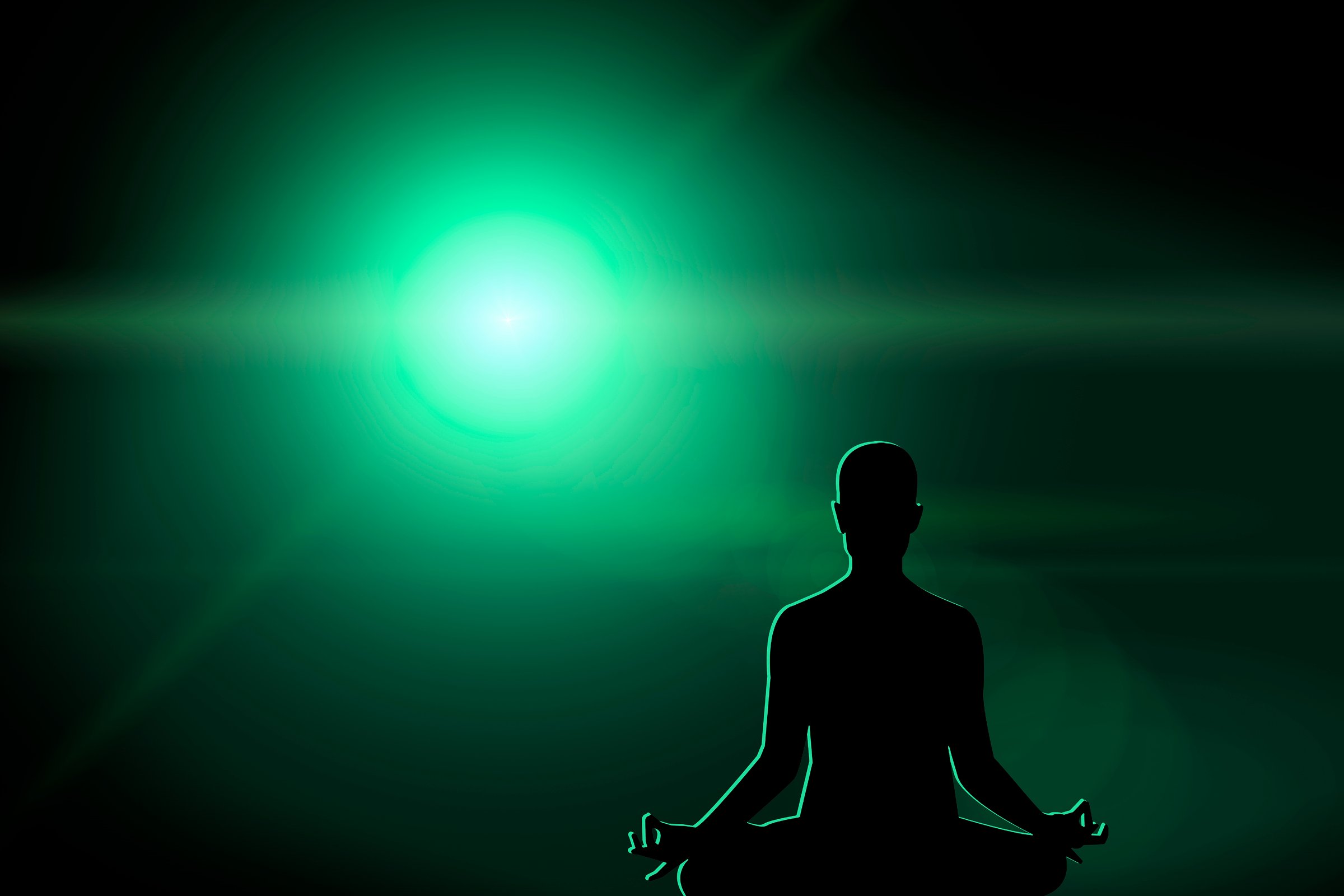 Yoga in the lotus position. Fantastic abstract colored optical shapes as a background.