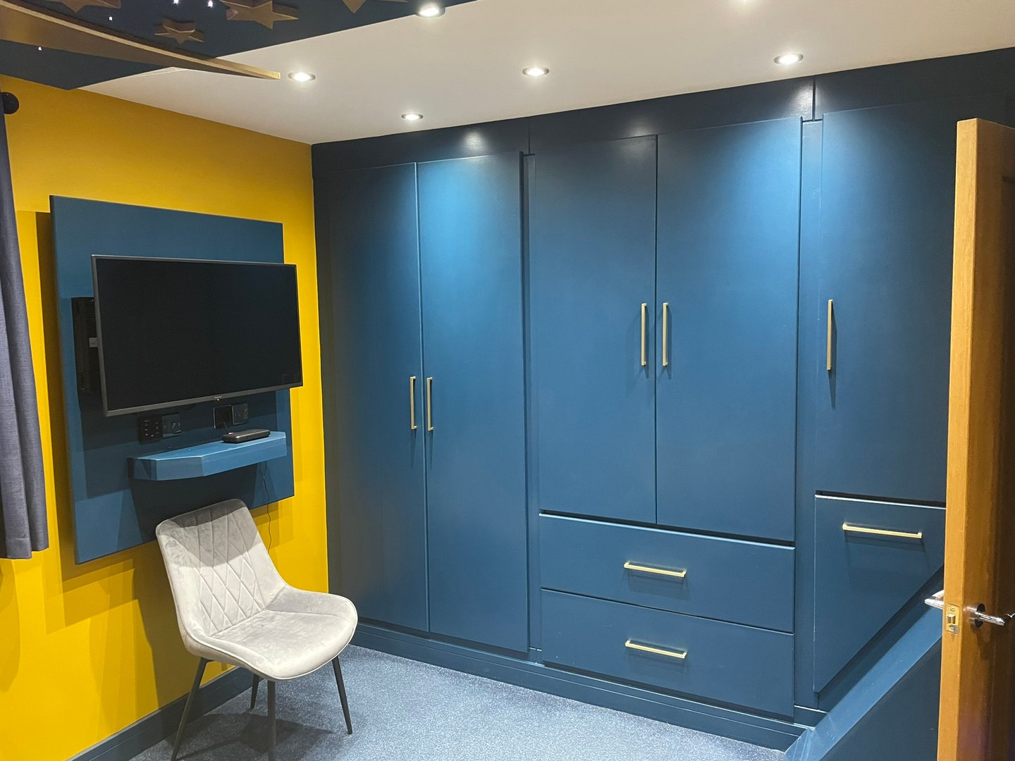 Elegant walk-in closet featuring glass-paneled wardrobes, arched doorway, and custom storage island, bathed in natural light for a sophisticated and luxurious feel. 3D rendering, 3D illustration.