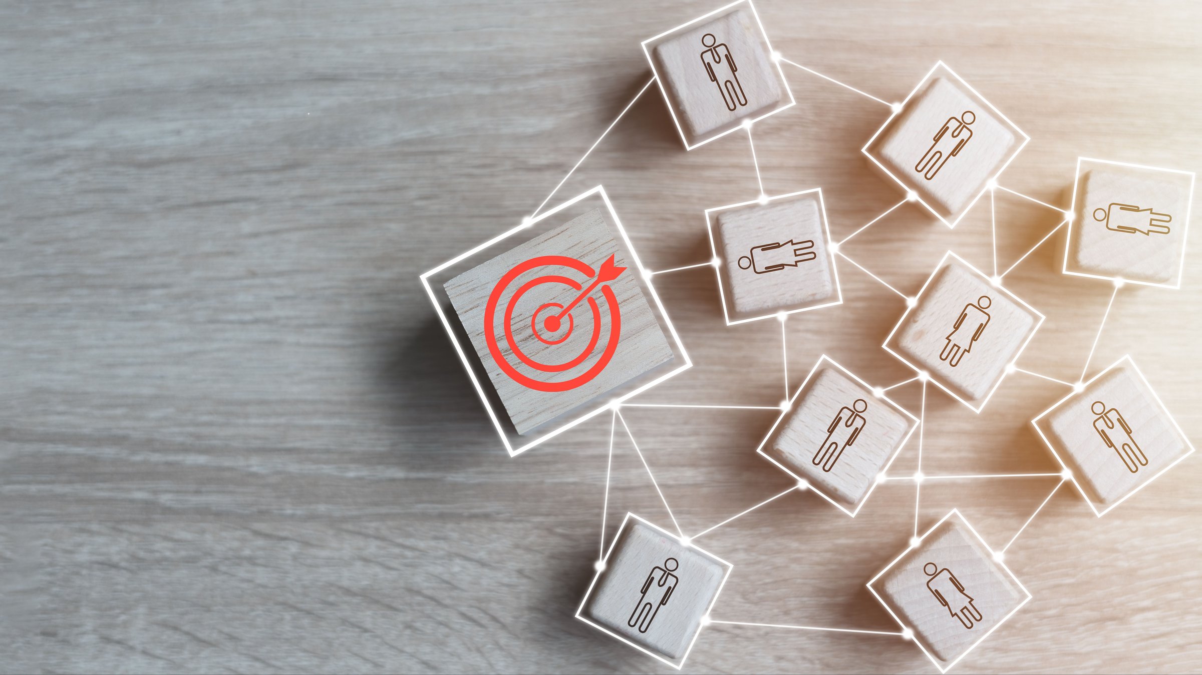 Red dart board and black arrow linked with human icon for customer oriented audience and customer relationship management.