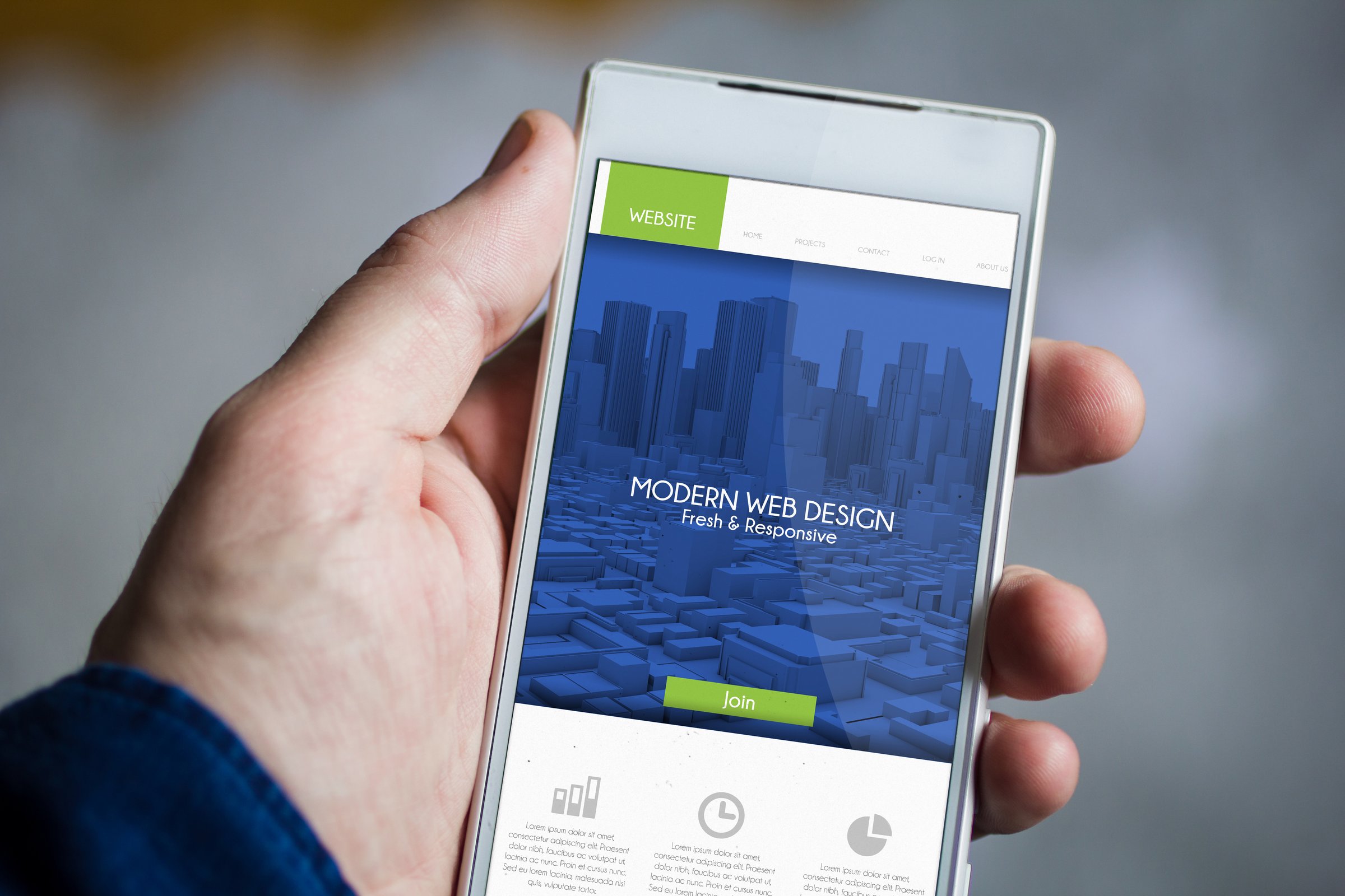 man hand holding smartphone with responsive fresh and modern mobile website. All screen graphics are made up.