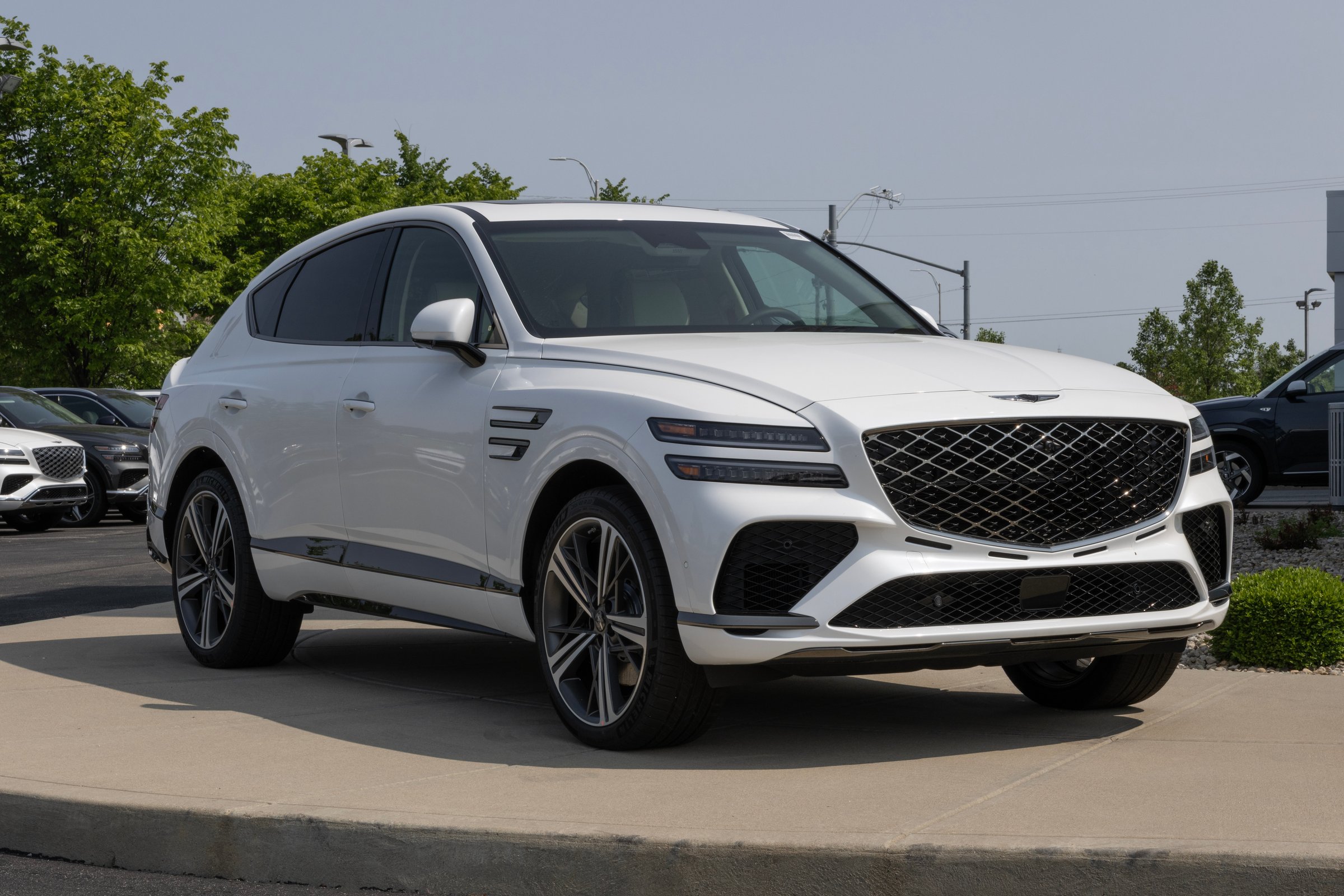 Noblesville - June 1, 2025: Genesis GV80 Coupe E-SC MHEV at a dealership. Genesis offers the GV80 with a 3.5L Twin-Turbo V6 Mild Hybrid engine. MY:2025
