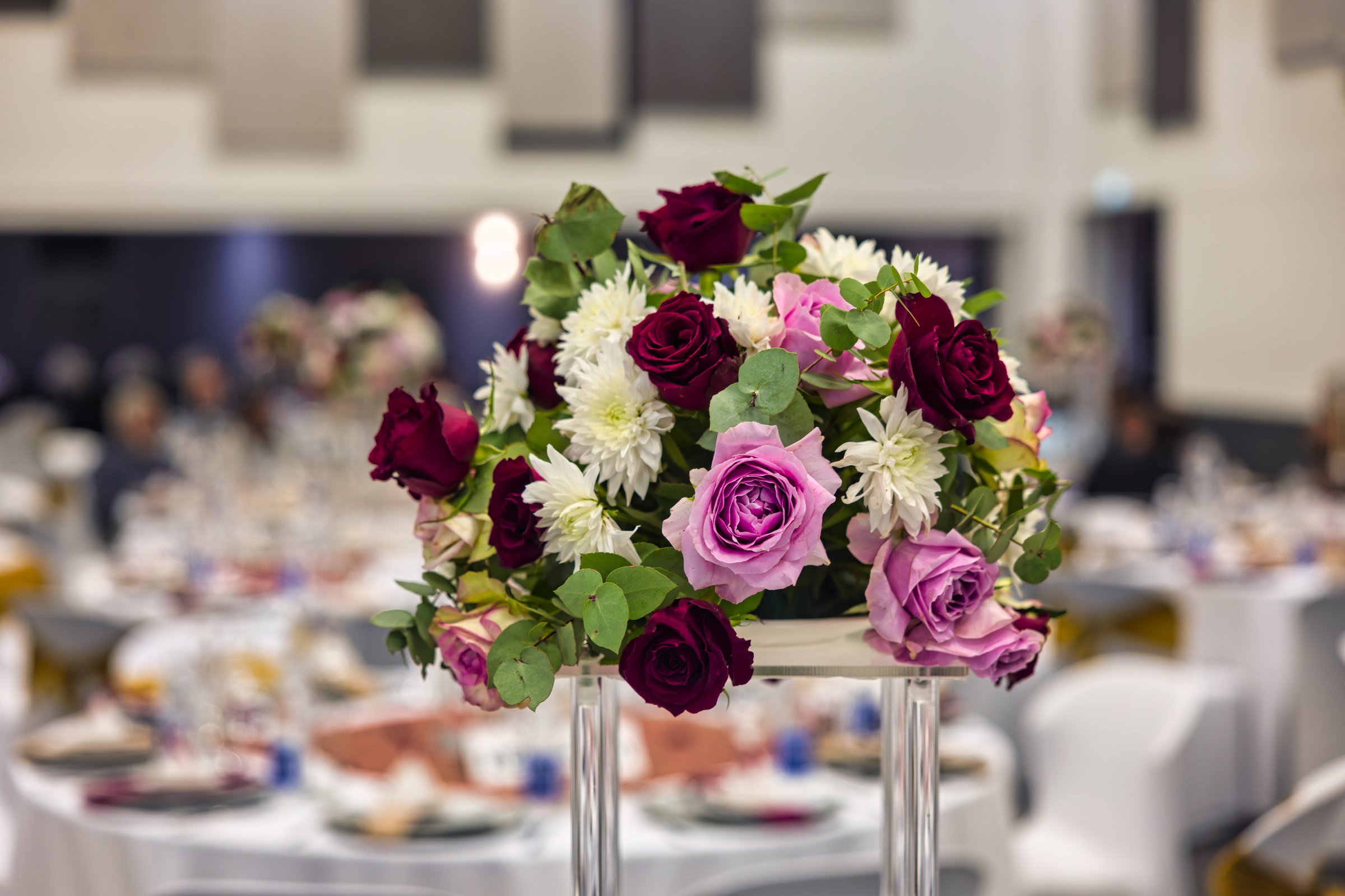 centerpiece floral design decoration, open bloom roses at a banquet event