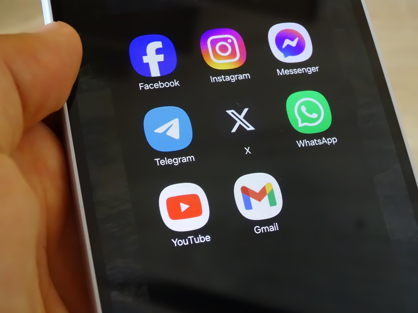 Baia Mare, Romania - September 04 2024: Social media icon apps on a smartphone screen: Facebook, Instagram, Messenger, Telegram, X, WhatsApp, Youtube, Gmail