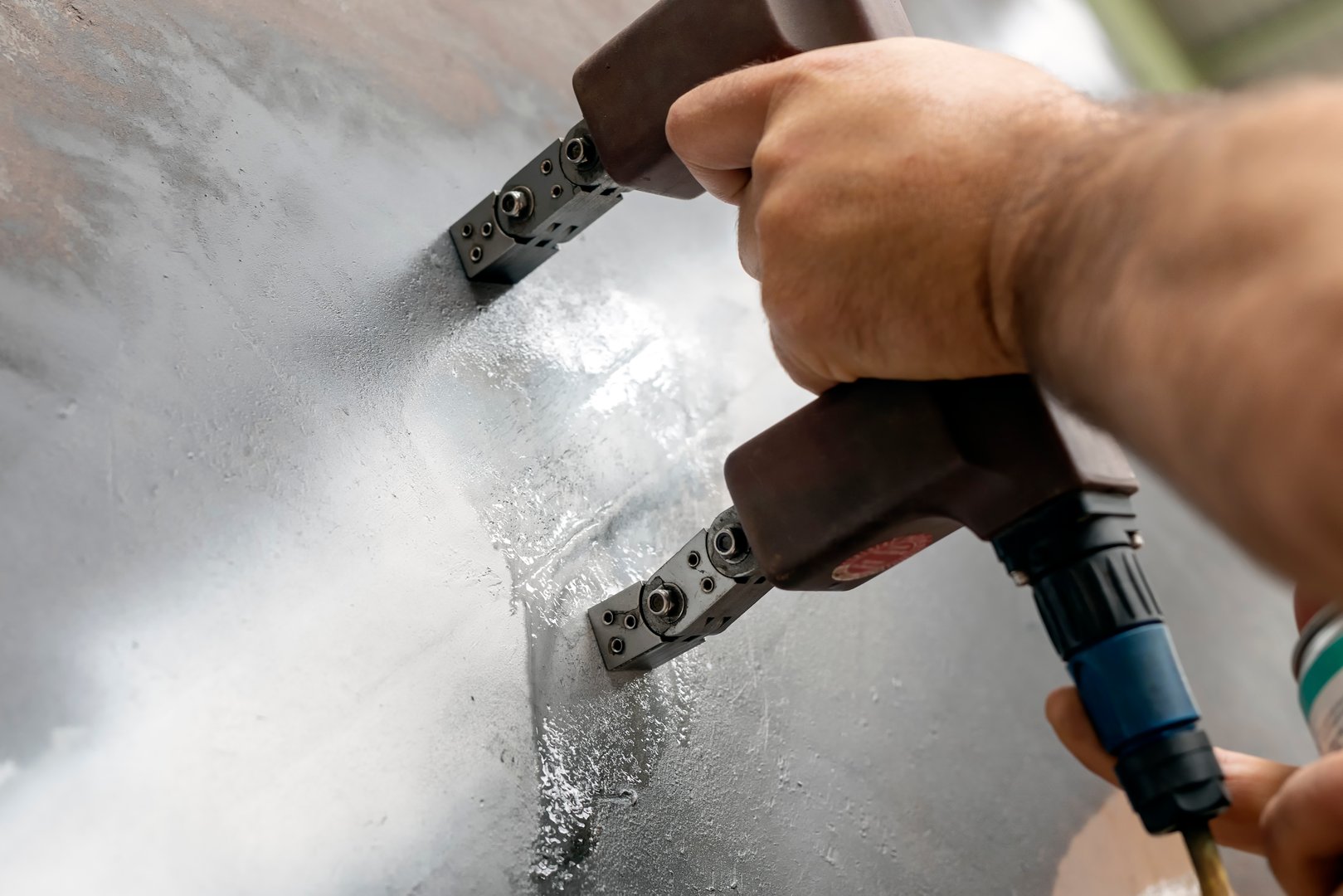 The inspector is testing with magnetic particle inspection method to welds of the pressure vessel. Magnetic particle Inspection (MPI) is a non-destructive testing (NDT) process for detecting surface.