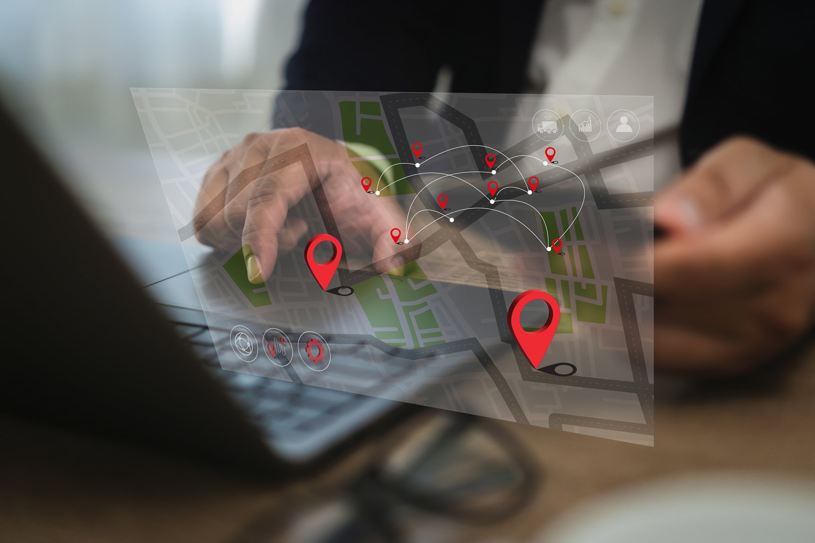 A gps tracking system real-time person interacts with digital map showing multiple location markers and route connections, indicating navigation