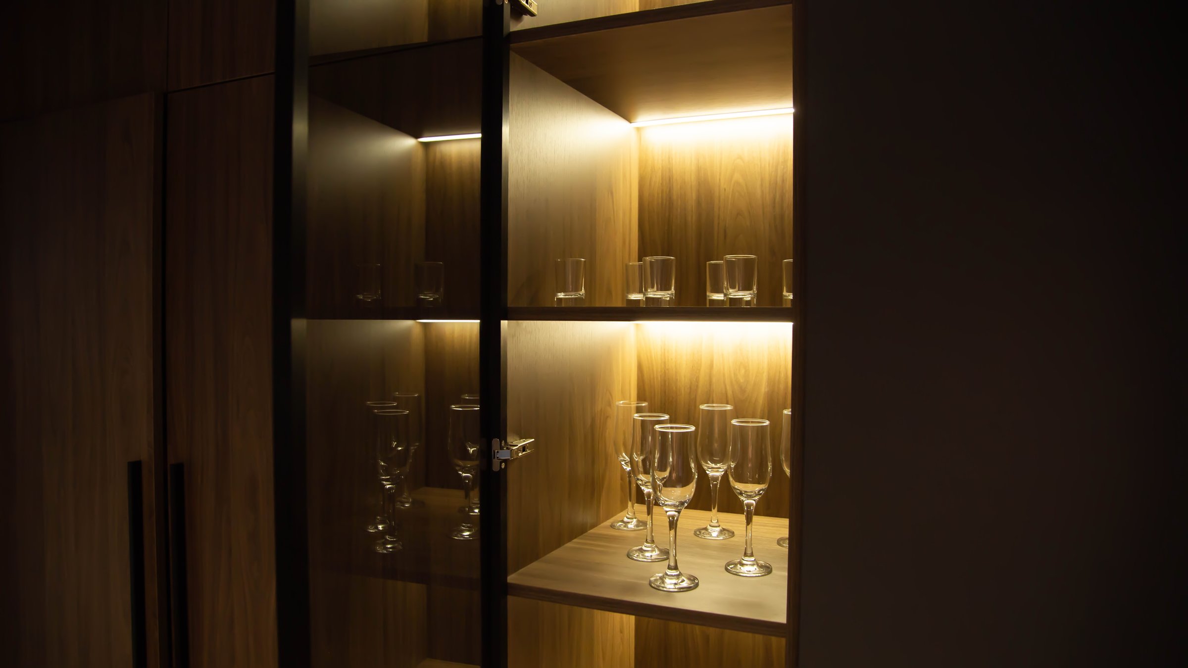 Custom cabinet with LED strip in shelves, beautiful design, technology