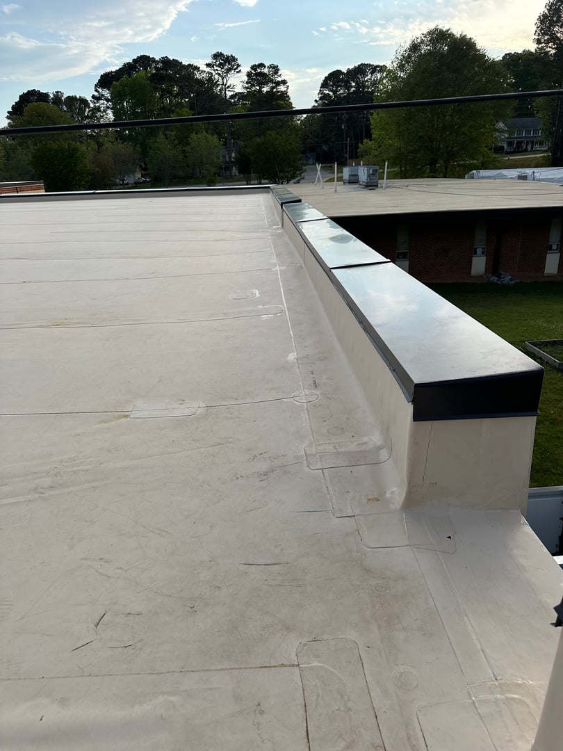Edge metal installation on commercial building