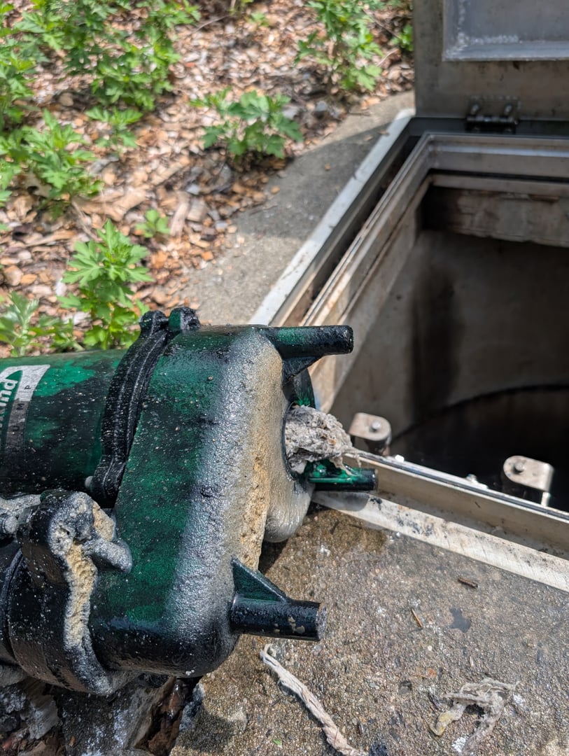Liberty grinder pump installed in a residential basement