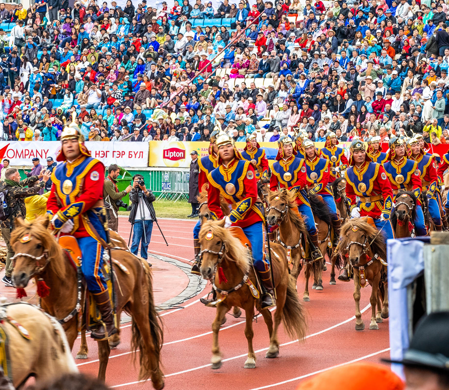 Mongolia's National Festival Naadam with traditional horsemen honor guards
