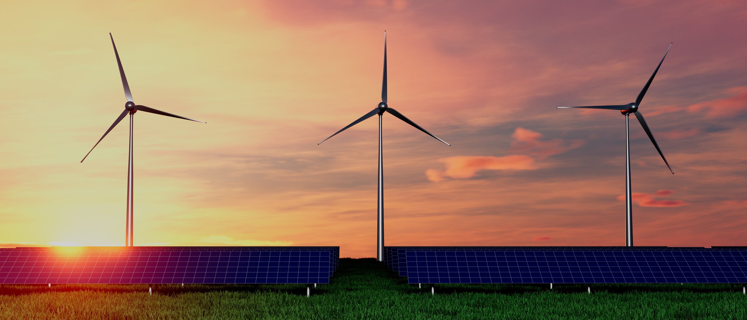 Three wind turbines are standing in a field with a sunset in the background. Scene is peaceful and serene, as the turbines harness the power of the wind to generate electricity