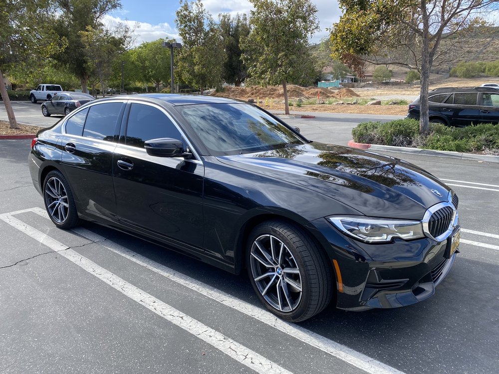 Automotive window tinting