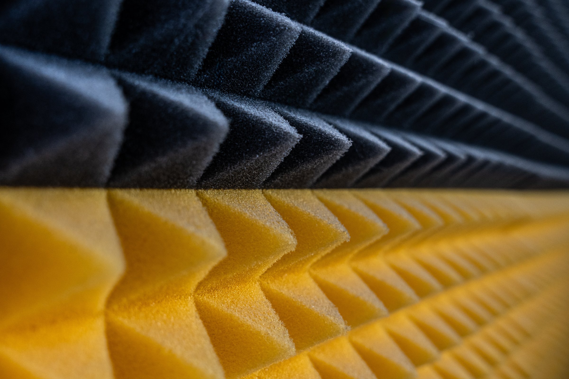 Detailed view of sound-absorbing foam used in studios for noise reduction