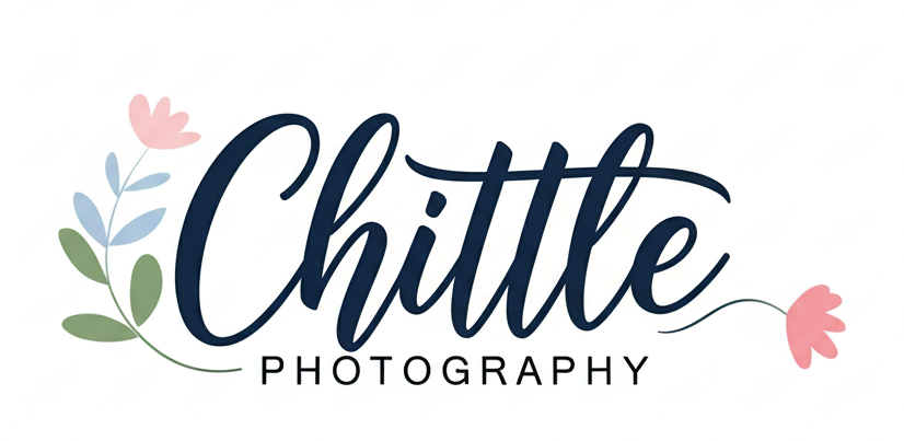 Logo of Chittle Photography with floral designs, featuring pink and blue flowers and green leaves.