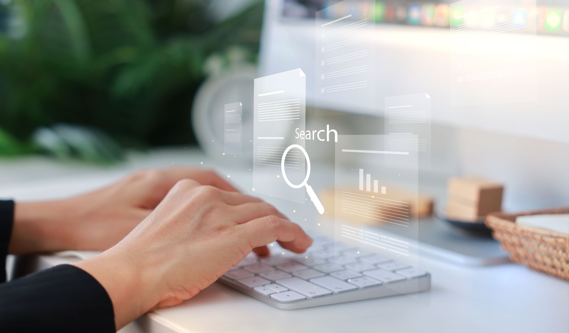 Hands typing on a white keyboard with search bar overlay, representing internet browsing, SEO, online research, digital marketing, communication, data input, coding and information search concept.