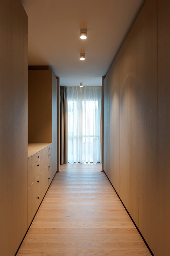 Interior of a private house checkroom. Only large wall-mounted closets. Nobody inside