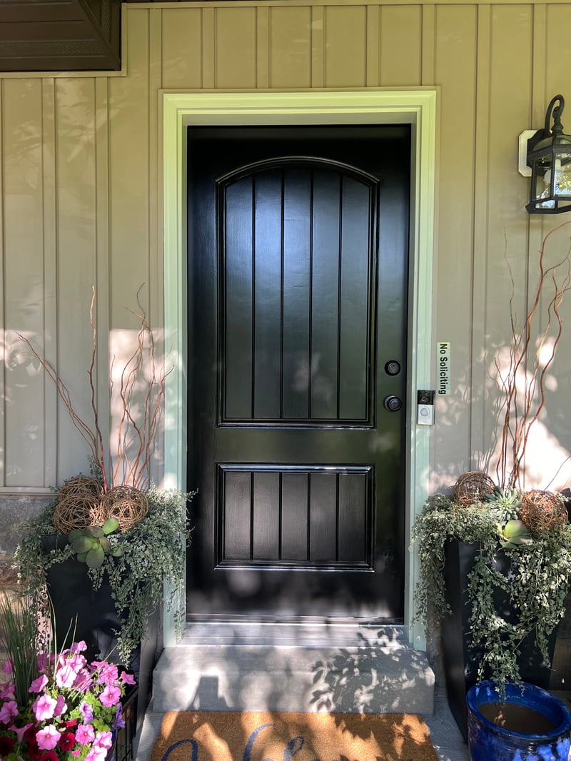 Home repair project with new paint and drywall patches