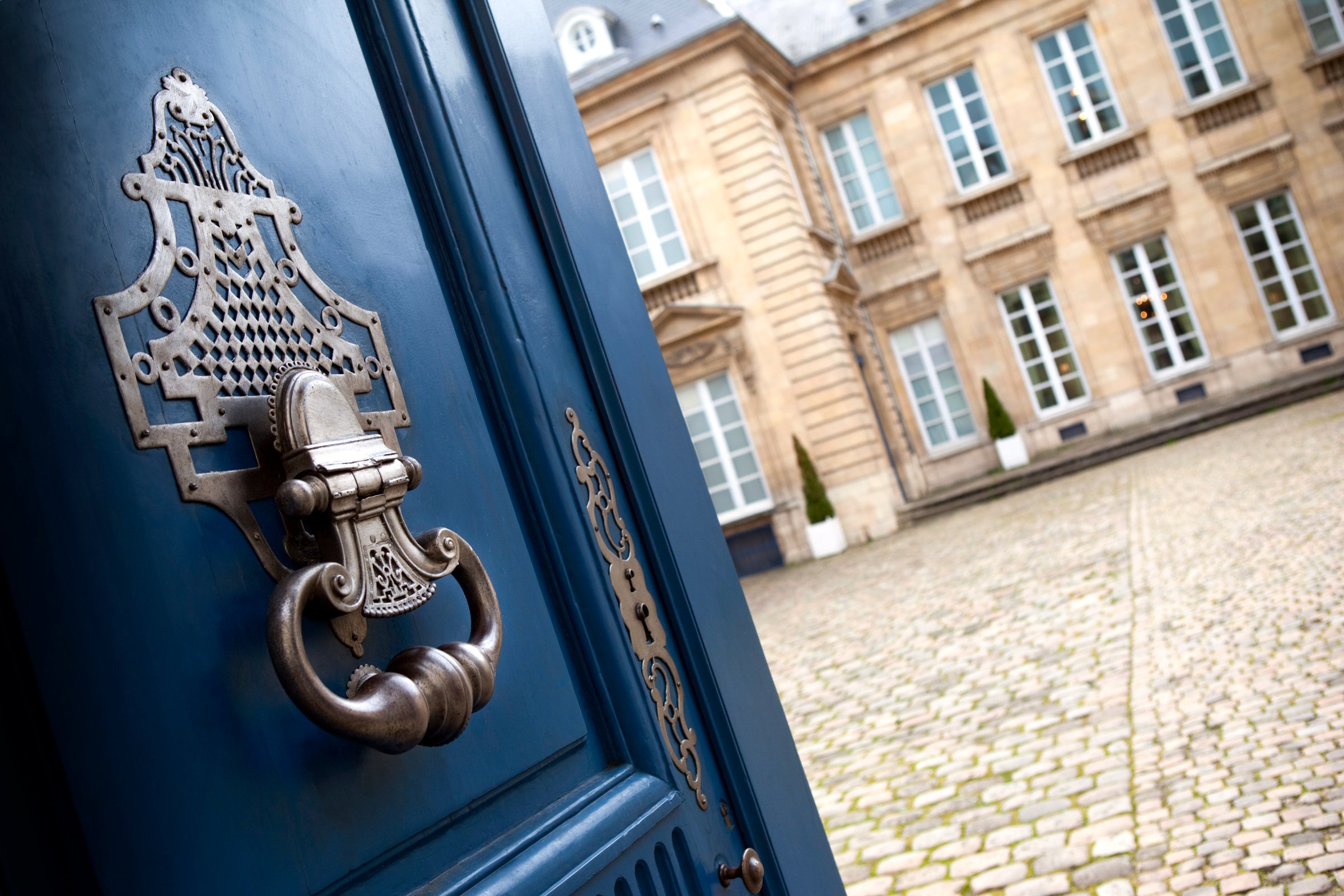 Door open to an old French mansion in Bordeaux