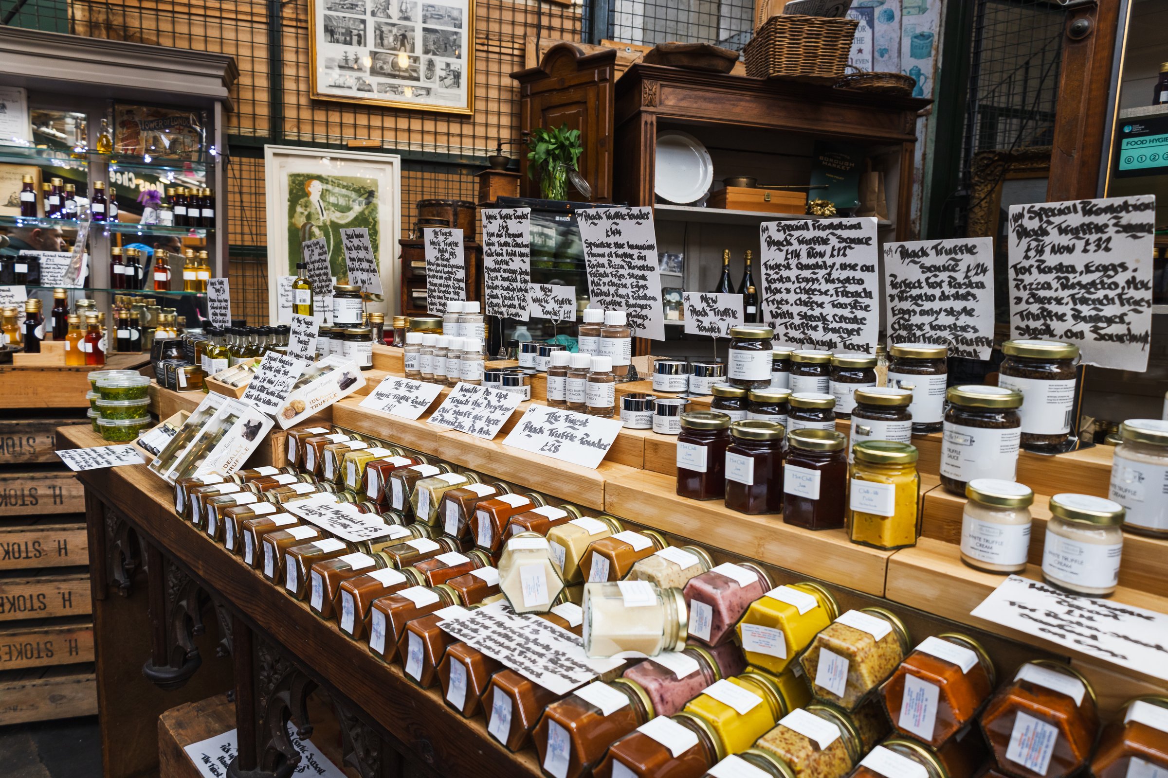 Gourmet spices and natural products displayed for sale at popular Borough Market. London, UK, 29 March 2024