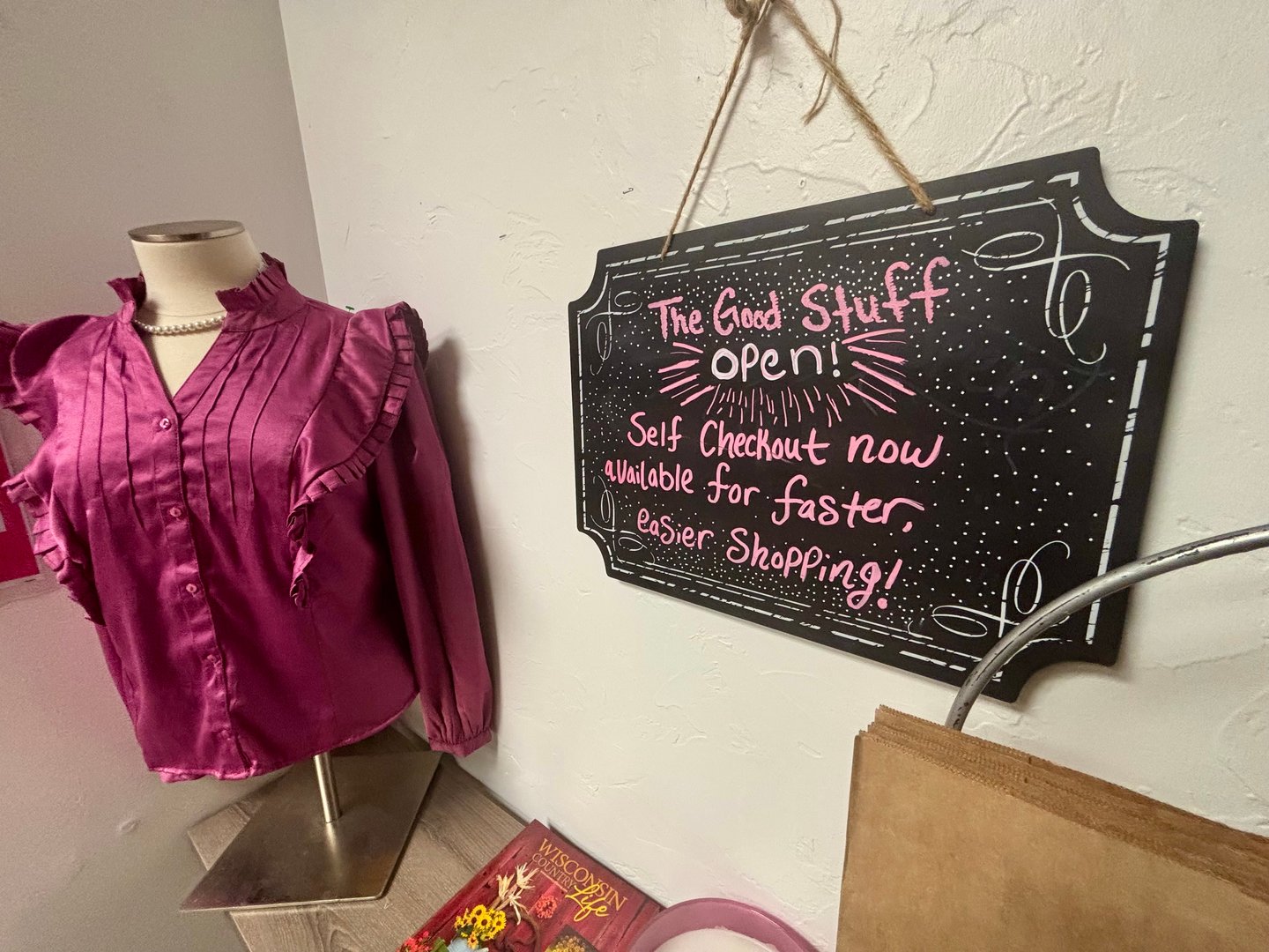 Resale boutique interior with clothing displays