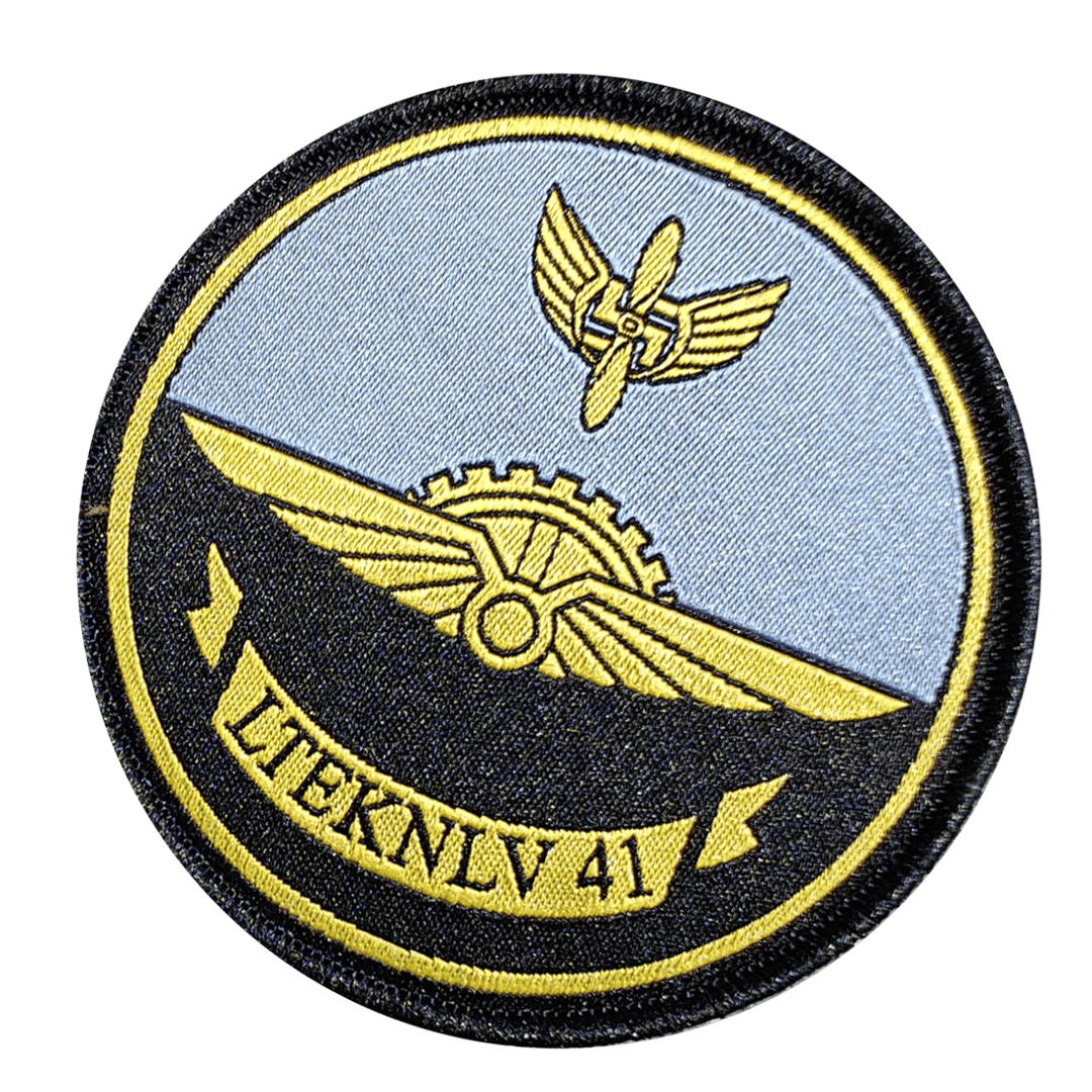 Round patch with a gear and wings design, featuring LTEKNLV 41 text at the bottom, on a blue and black background.