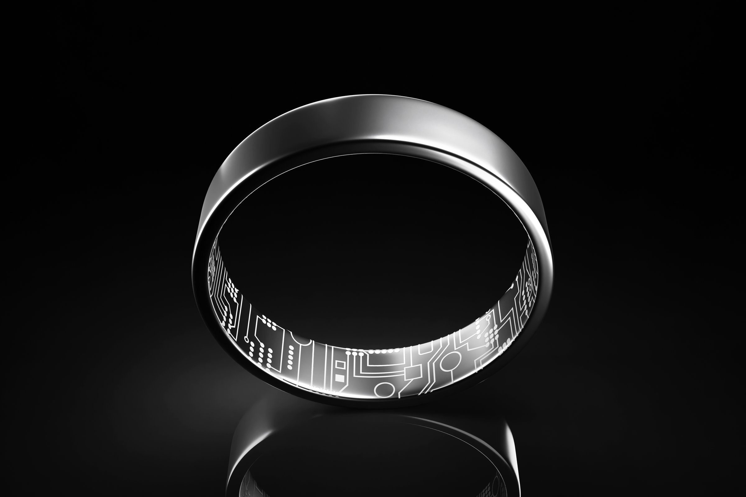Silver smart ring showing electronic circuit. 3D illustration of the concept of futuristic technological control methods of computerized devices and health tracking