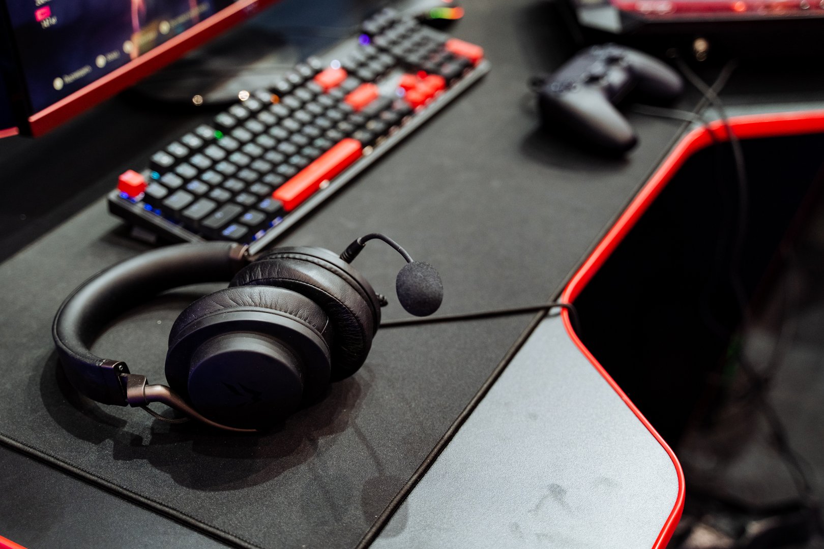 Imagine a modern gaming setup featuring a quality headset, ergonomic keyboard, and responsive controller, all designed for immersive gameplay and competitive fun