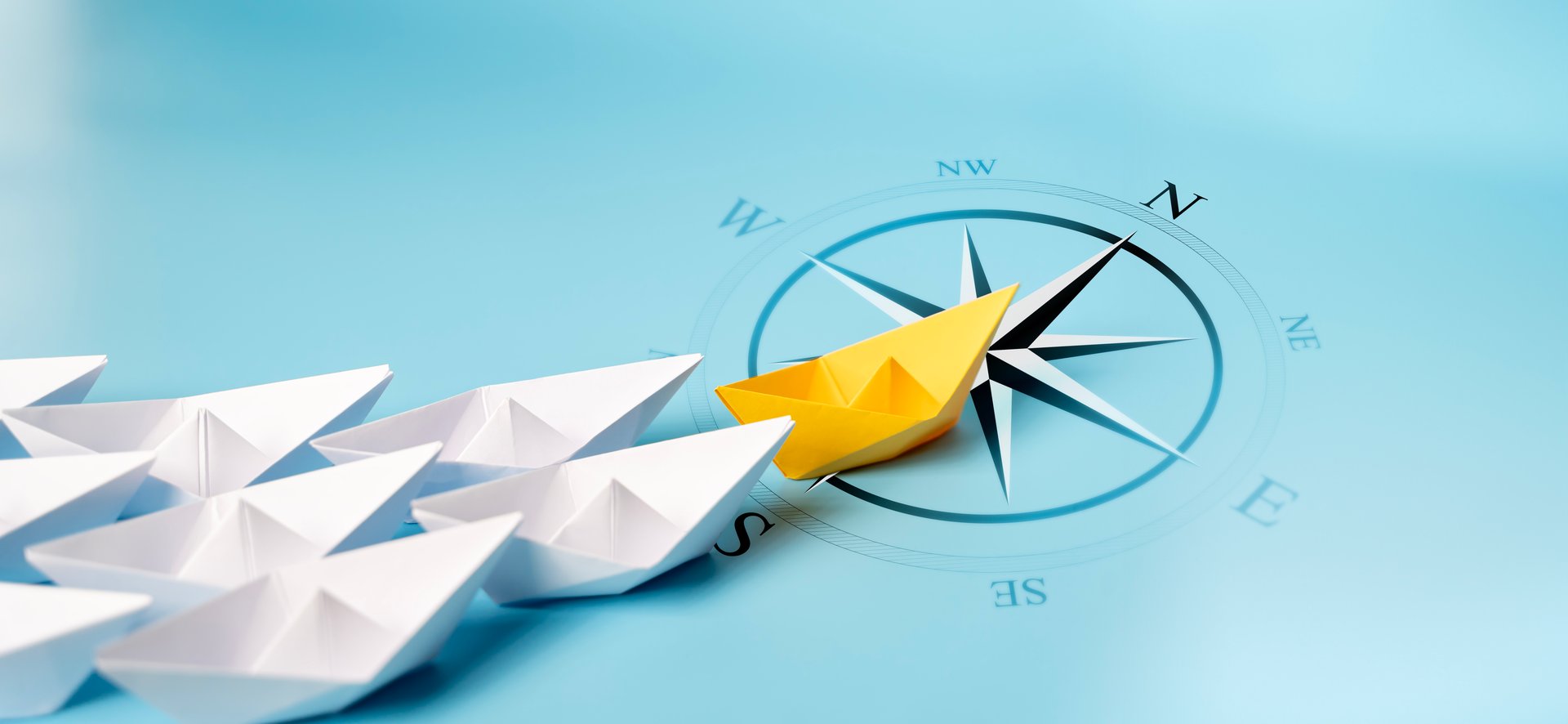 Yellow Paper Boat With Compass Leaving Mainstream And Changing Direction. Entrepreneur Business Opportunity.