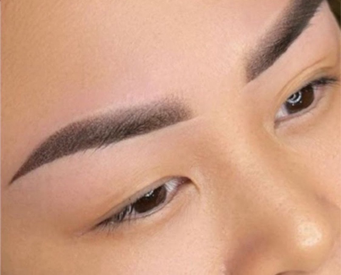 Precise application of permanent makeup on eyebrows