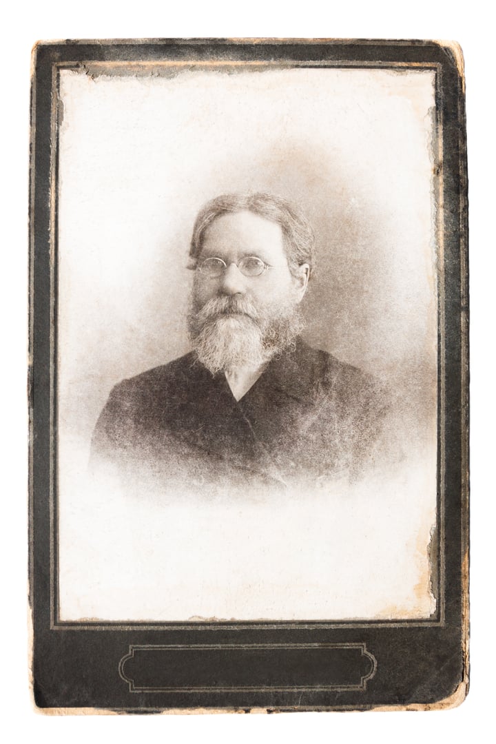 retro antique photo early twentieth century. vintage photograph,  portrait old man with beard and moustache with glasses 1900s 20th century