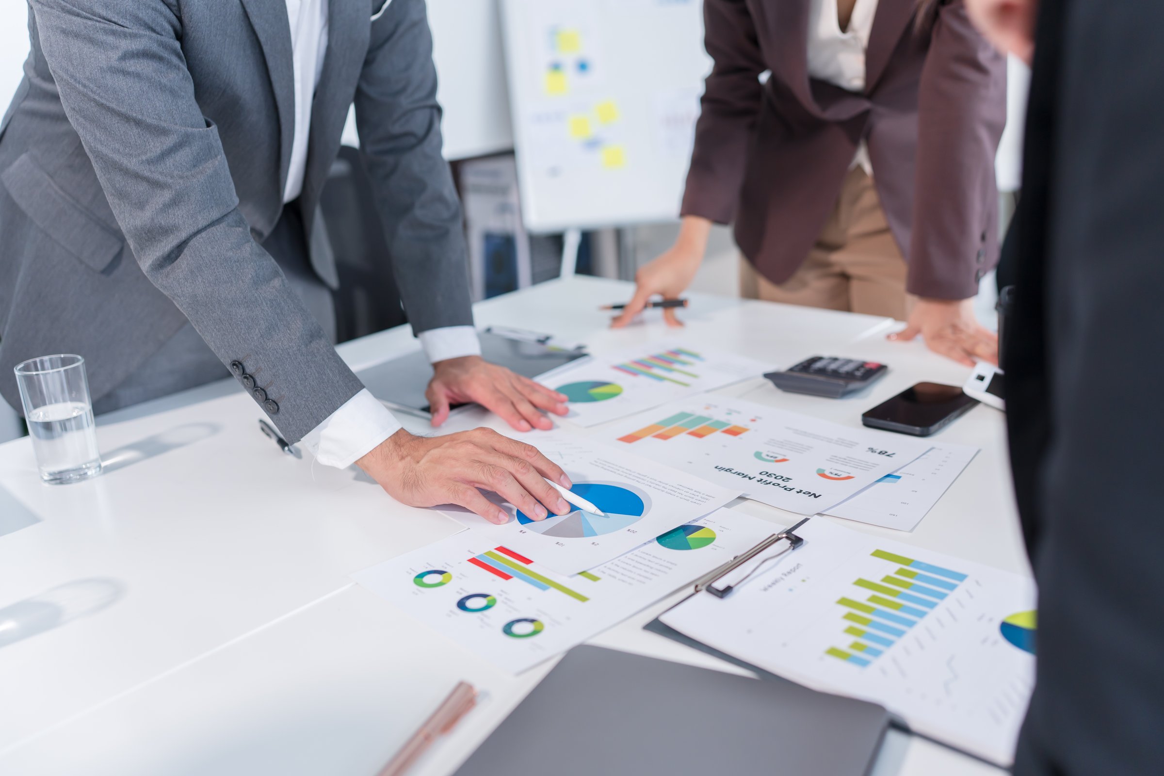 Asian Business Group Meeting, Documents, Graphs, About Business Investment, Office
