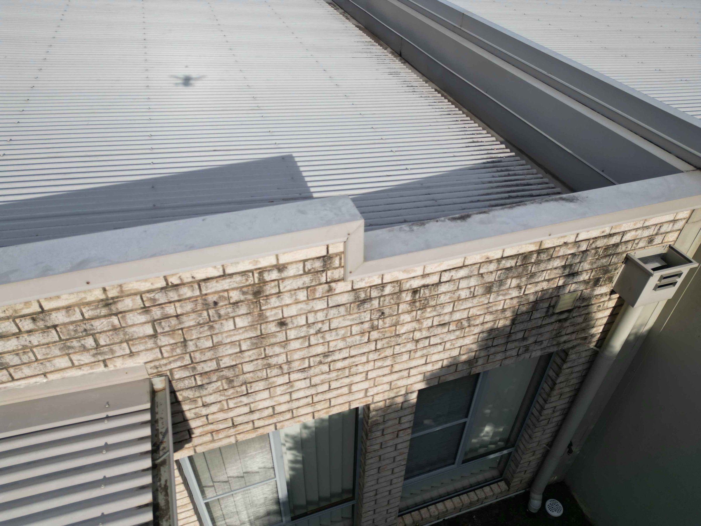 Aerial drone view of cleaned property exterior