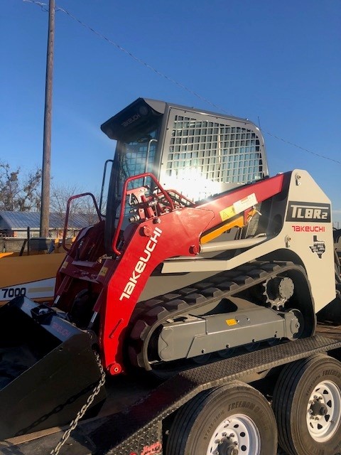 Allstar Paving skid steer equipment on job site