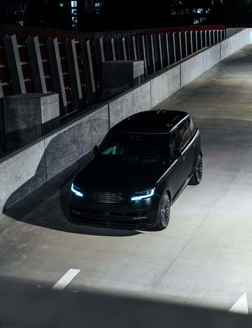 Black Range Rover luxury SUV with restored headlamps