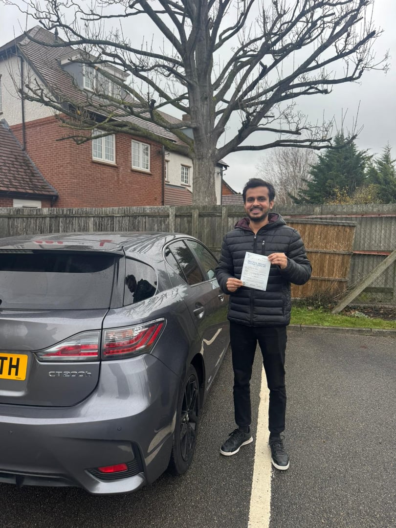 Successful driving test student with pass certificate