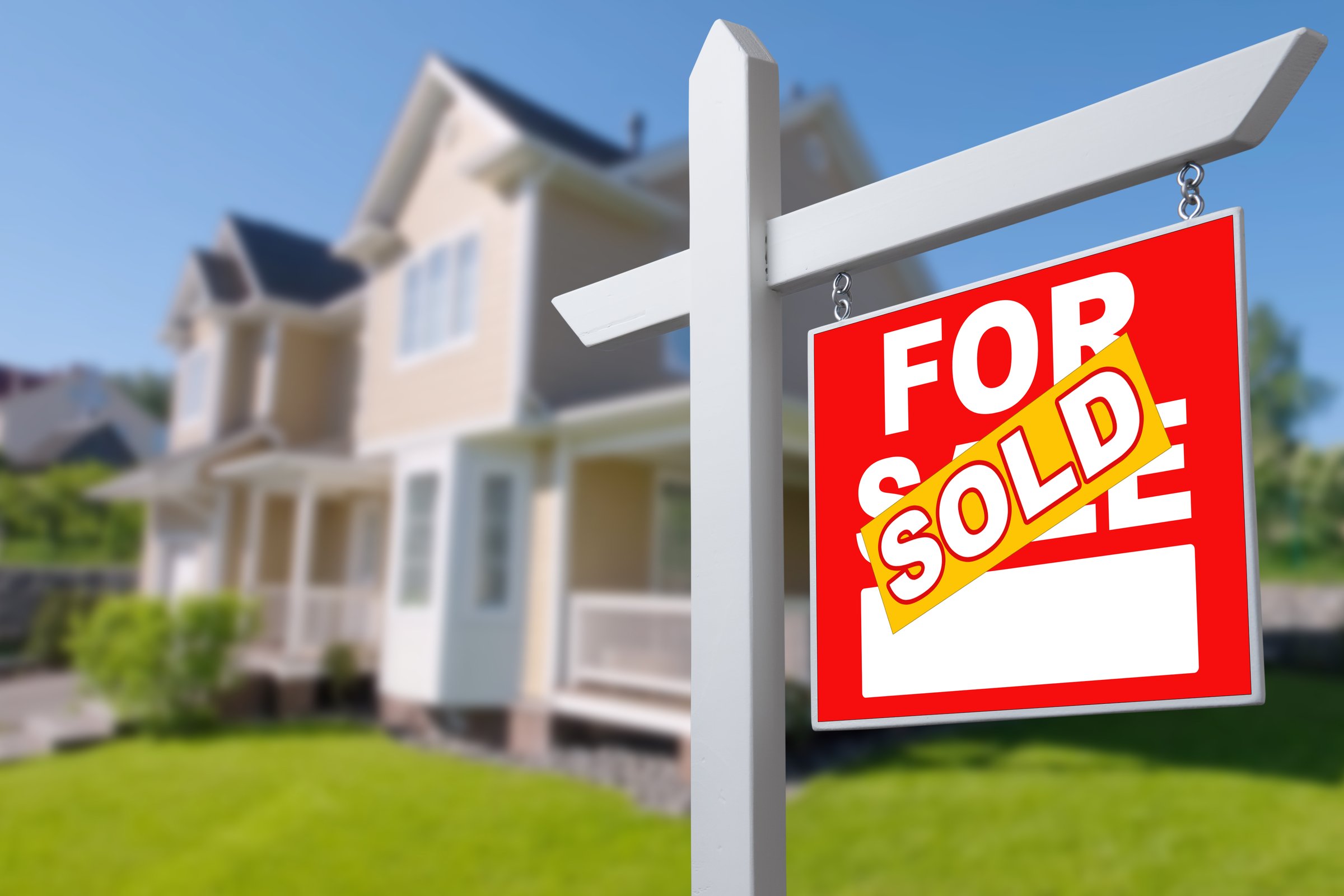 Sold Home For Sale Sign in Front of New House