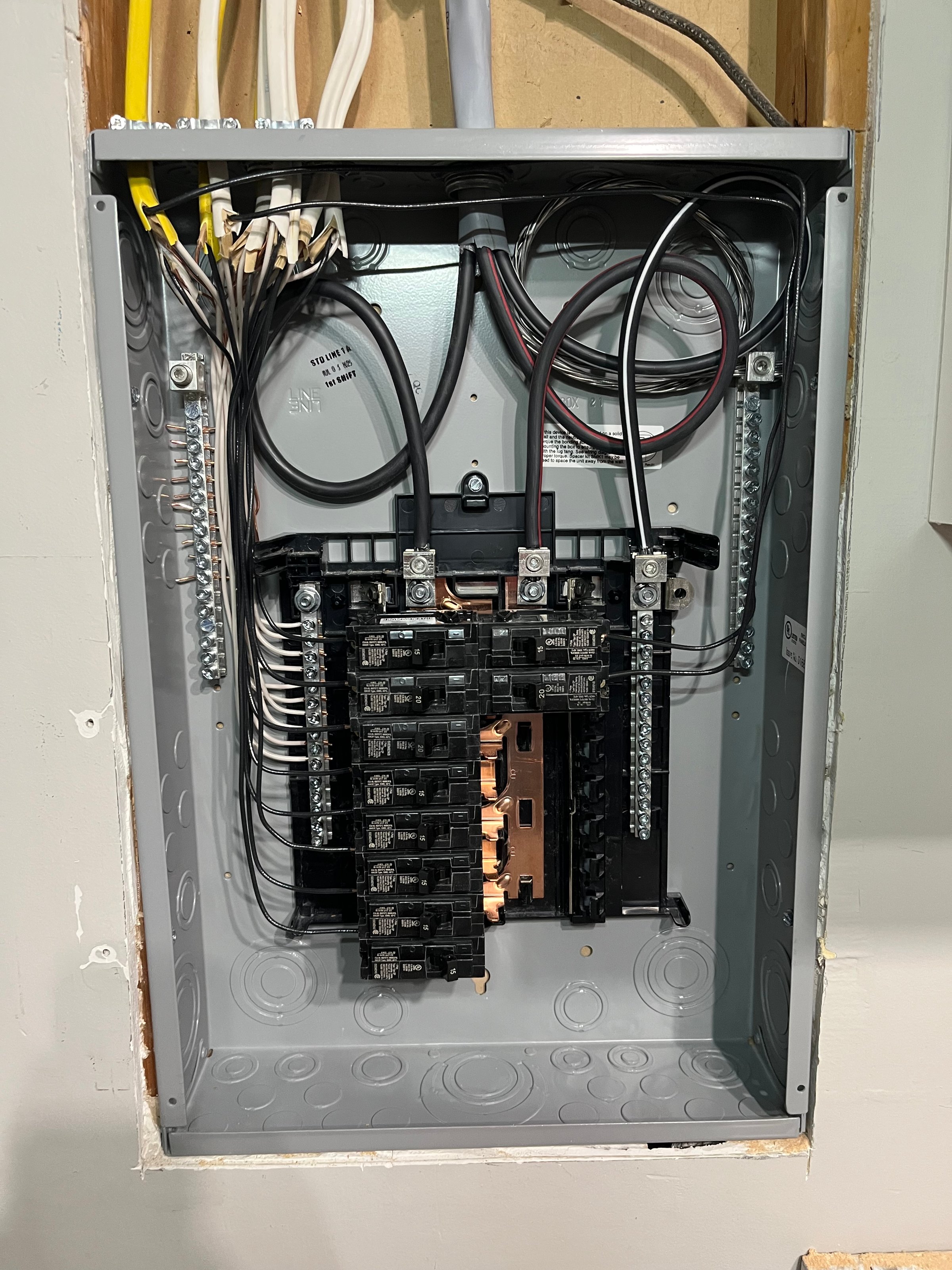 Residential electrical panel upgrade with circuit breakers and wiring