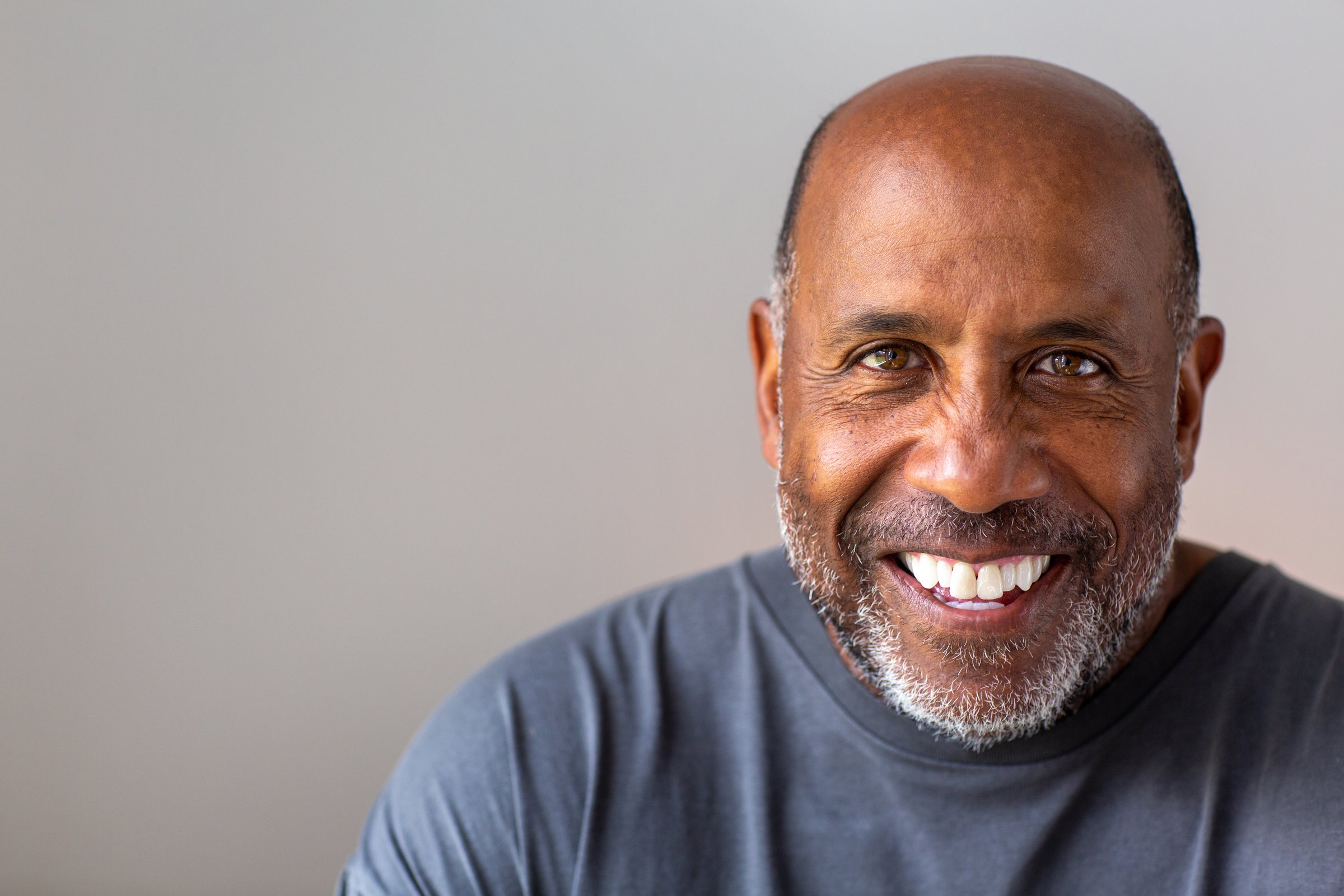 Happy older African American man smiling
