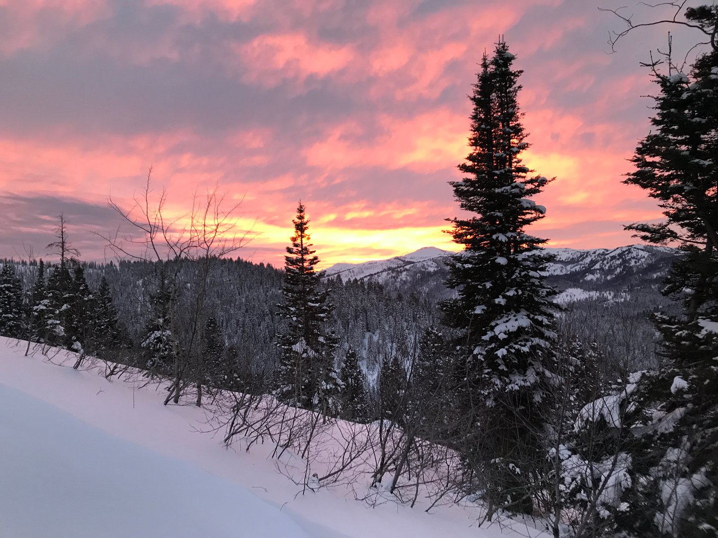 Beautiful sunset sky over snowy mountain landscape