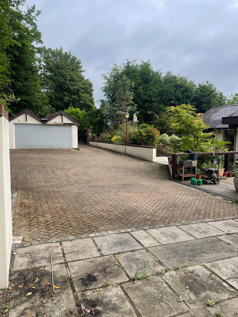 Dirty driveway before pressure washing