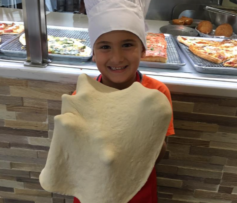 Children enjoying pizza party