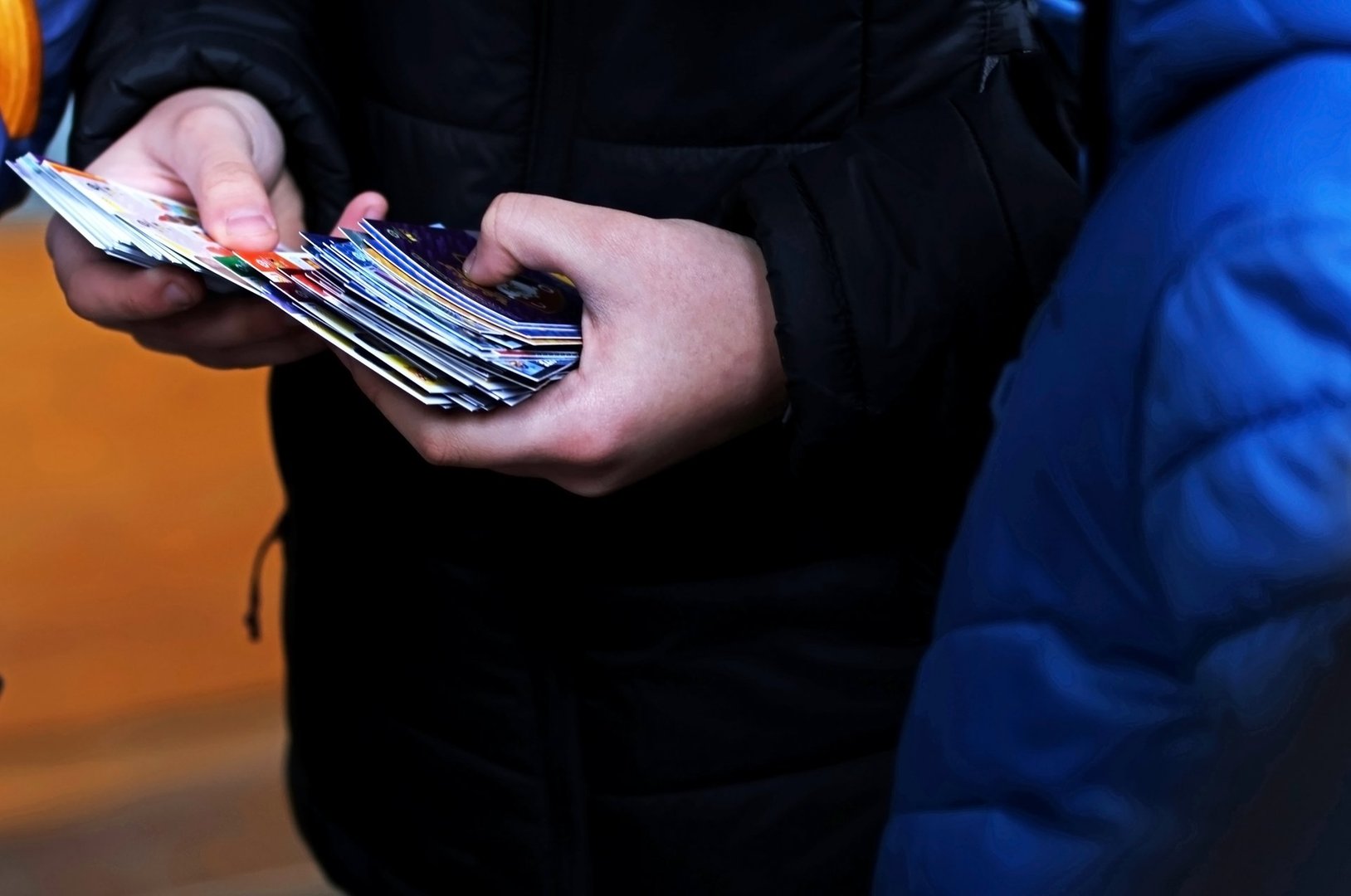 Children changing collectible soccer cards at school