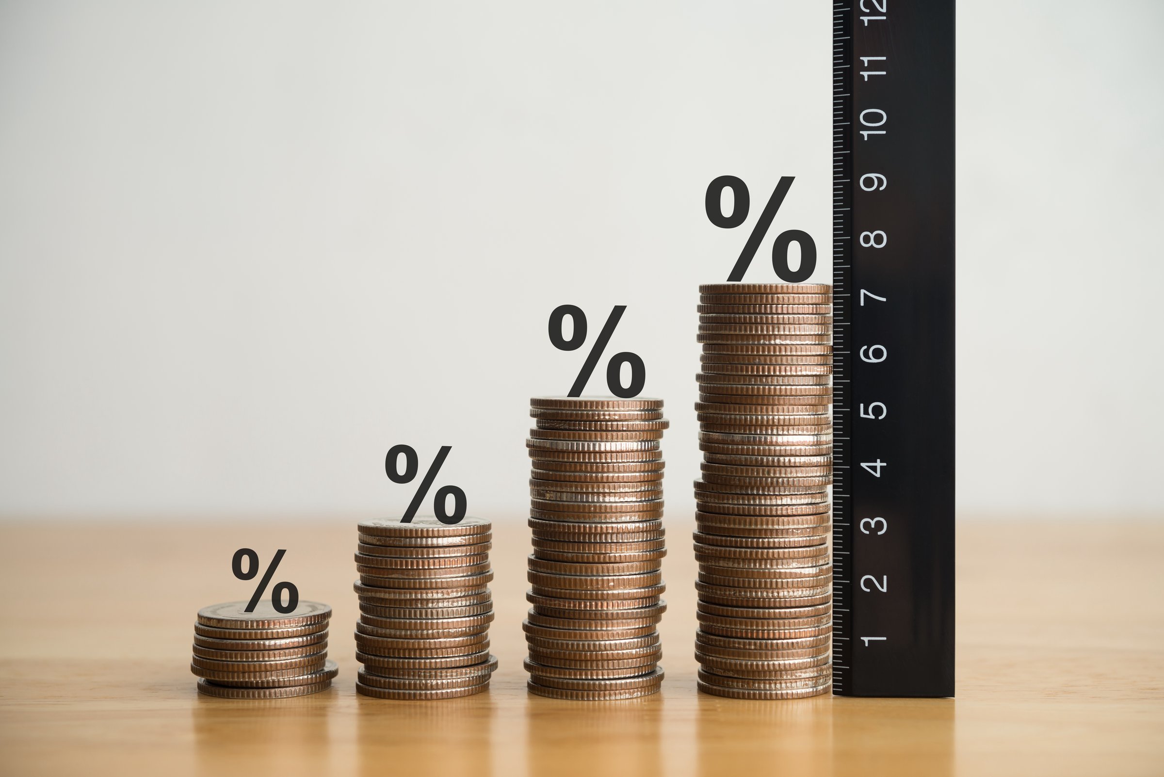 Growth stack coins chart with percent sign and measure ruler. Wealth or financial health assessment, kpi target achieve evaluation, risk management planning in business, financial, investment concept