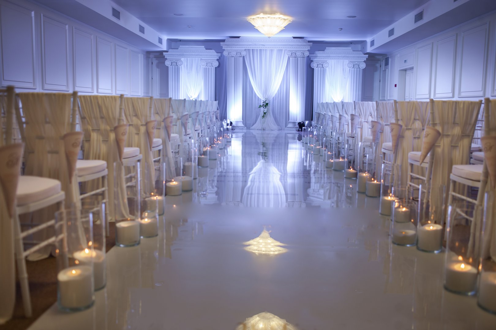 Wedding ceremony with candles in the hall.
