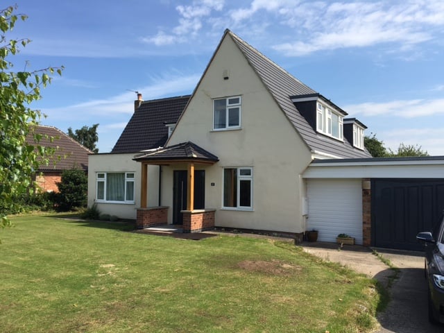 TA Roofing completed project - front entrance and new roof