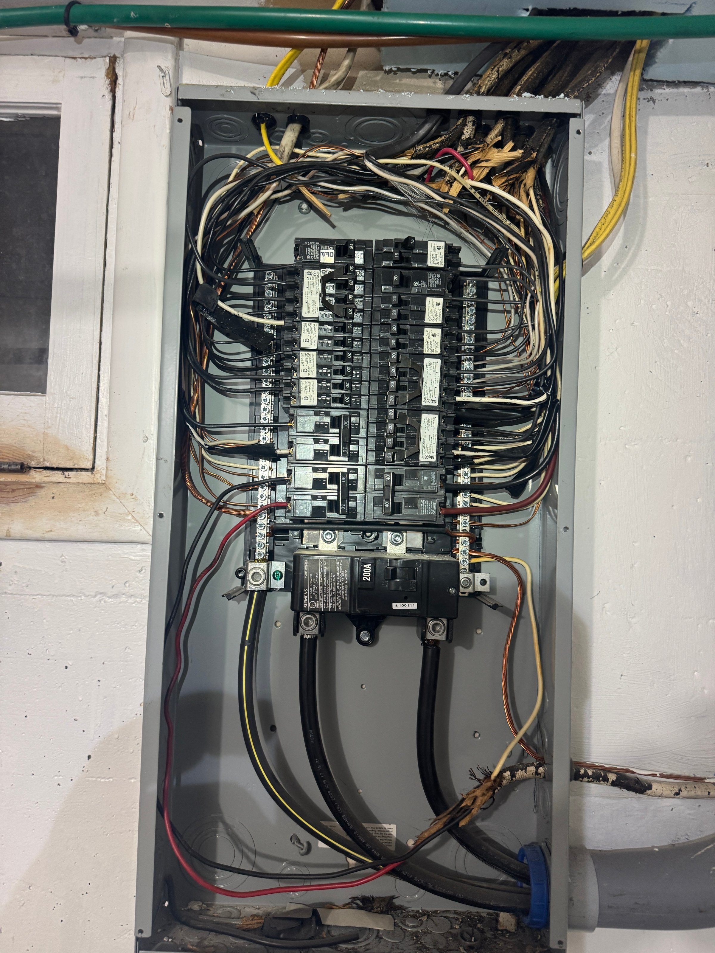 Electrician installing equipment